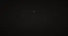A sparse network of interconnected nodes in darkness, one glowing brighter than the rest